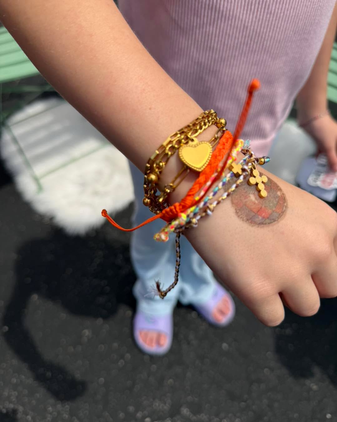 The hart bracelet has been so popular even with the littles! Only $15 for this three strand bracelet and I have two available 🩵 Styled here with one of the string bracelet sets 🧡💛✝️